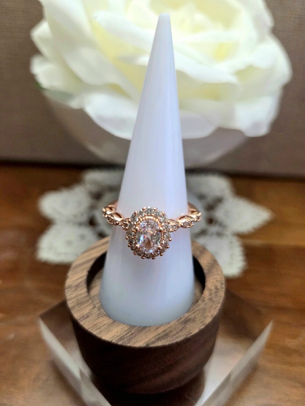 BP Rose Gold Oval Halo Ring with Twisted Band and Sparkling Accent Stones